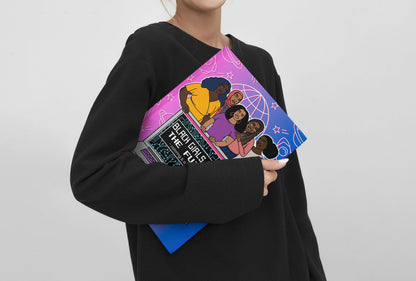 Person holding a book titled 'Black girls code the future' with a colorful cover design of diverse women
