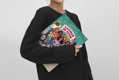 Person holding a colorful book titled 'Latinas in stem' against a plain background
